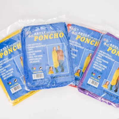 厂家直售景区旅游户外漂流骑行加厚便携成人四合纽扣PE一次性雨衣